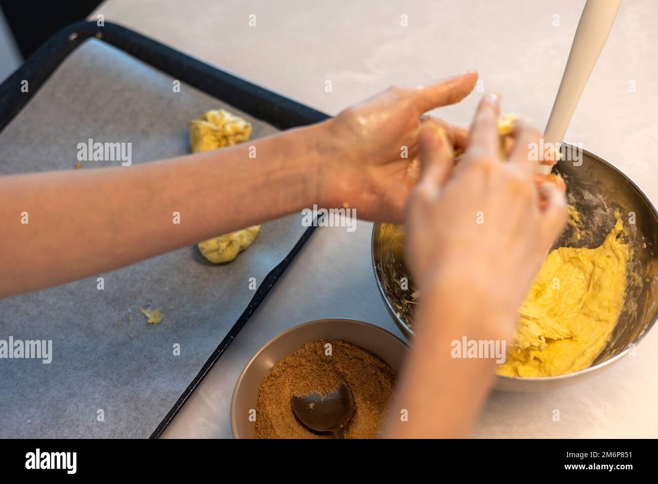 Making cookie bread with sugar before baking, shape dough into a ball