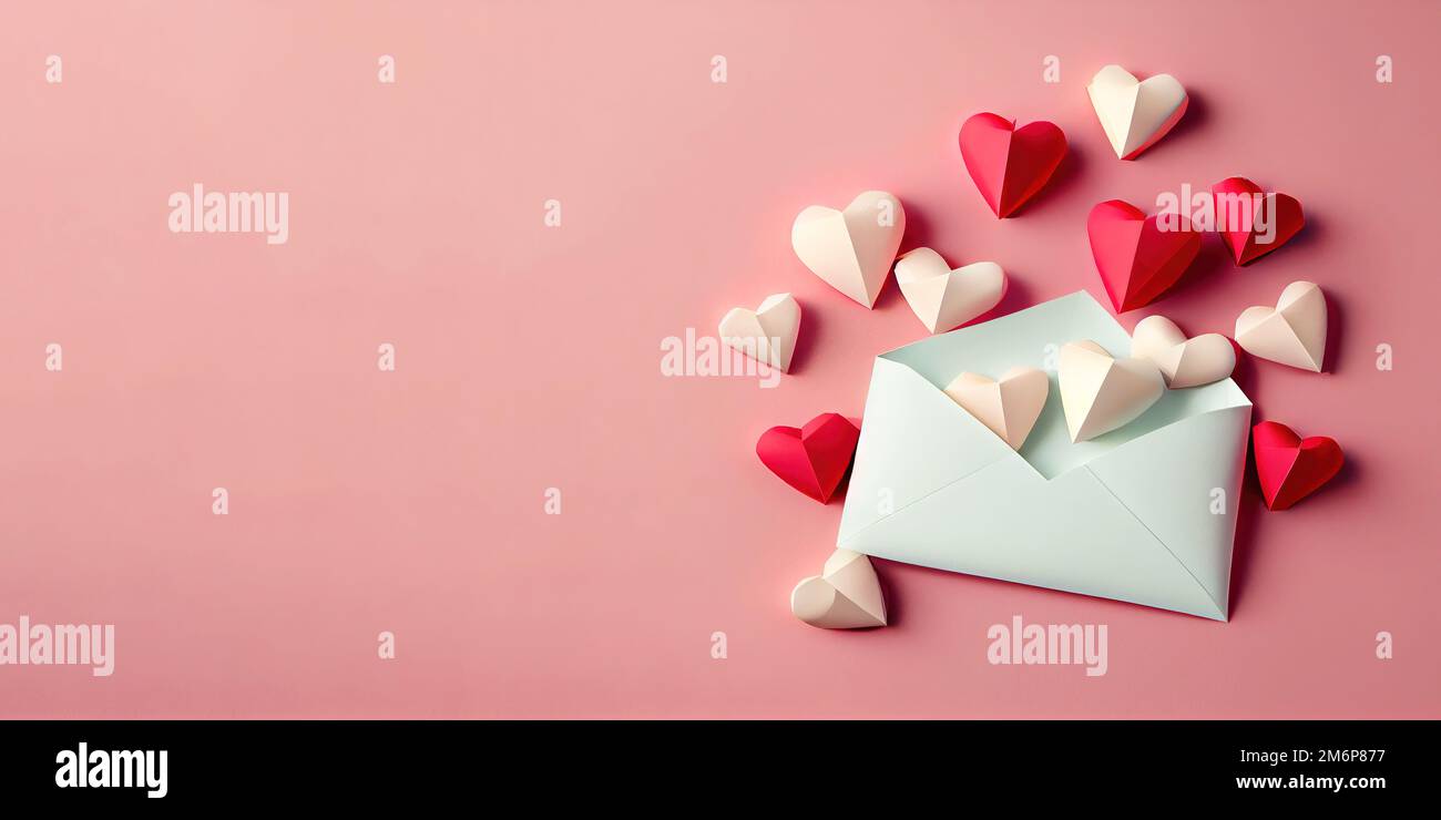 love letter envelope with paper craft hearts - flat lay on pink valentines or anniversary background with copy space Stock Photo
