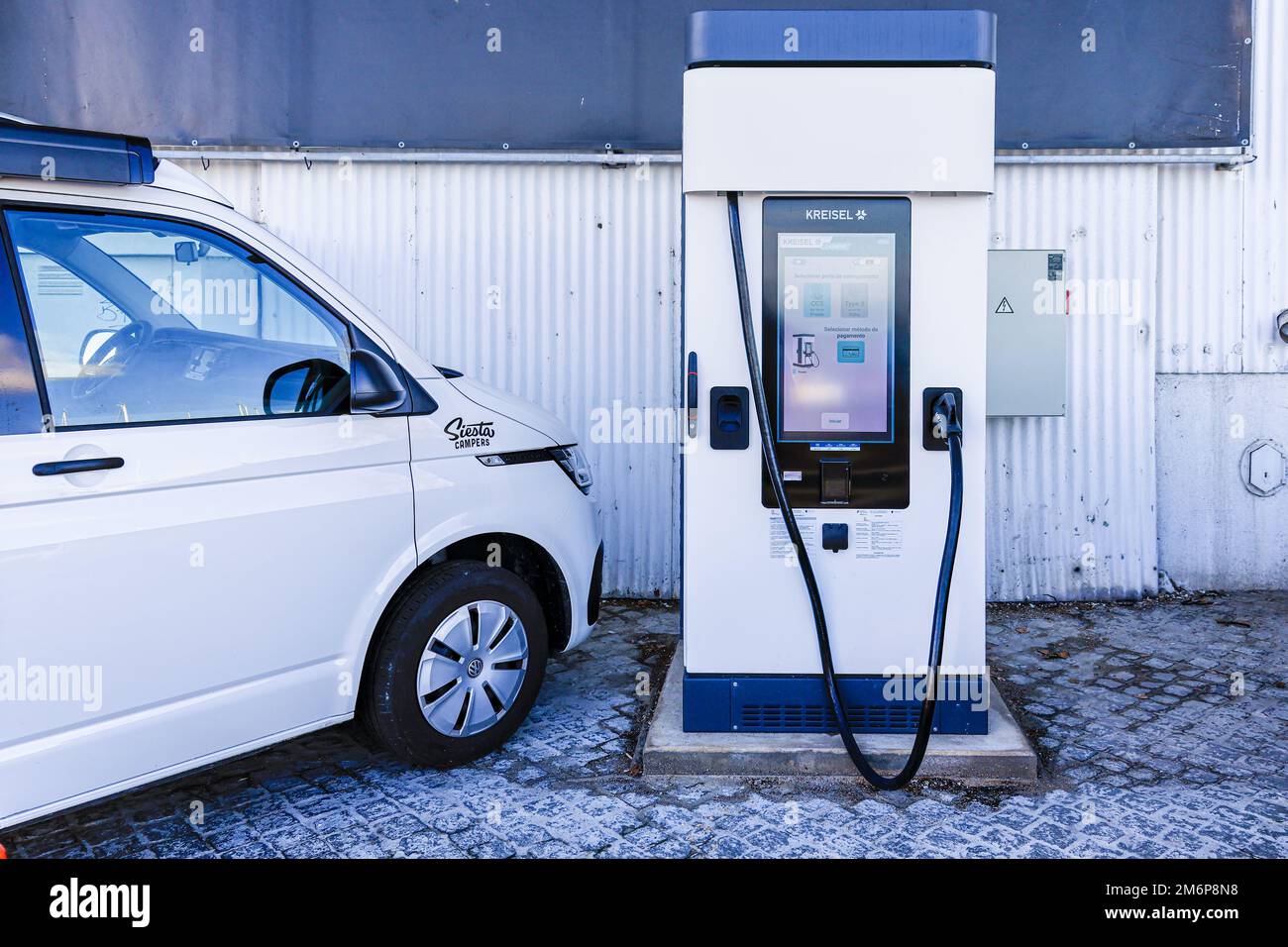 Charging station for electric vehicles and touring van Stock Photo