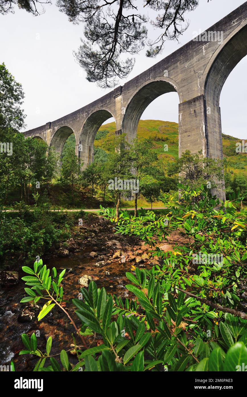 Glenfinnan viaduct, seen from the river Finnan, in the Scottish Highlands. Stock Photo