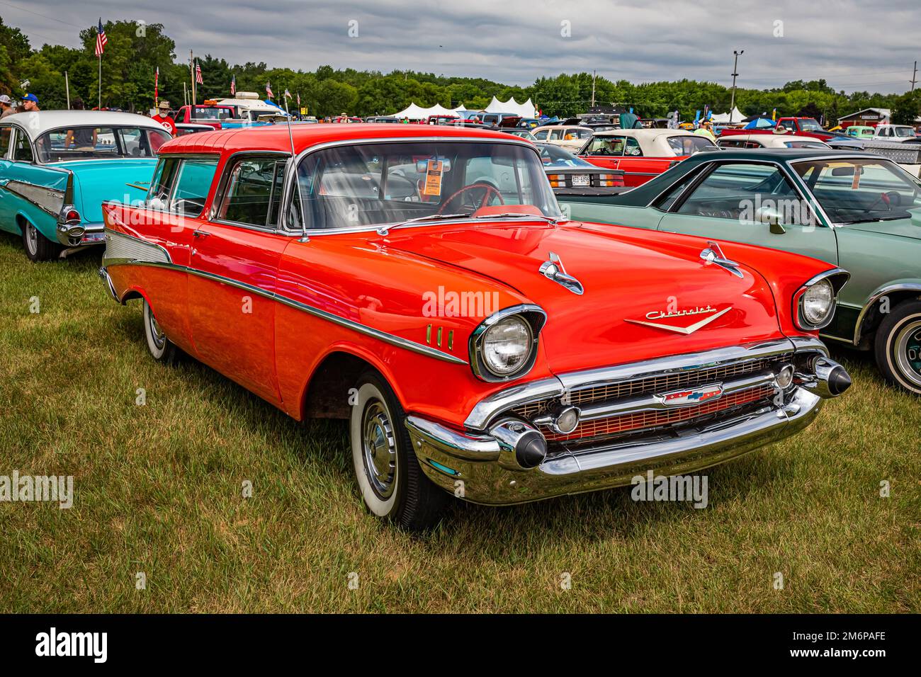 Iola, WI - July 07, 2022: High perspective front corner view of a 1957 Chevrolet Nomad Station Wagon at a local car show. Stock Photo