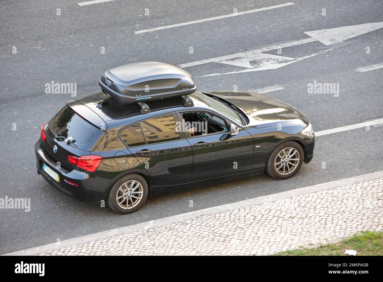 Vehicle from the manufacturer BMW with roof box to carry more cargo Stock  Photo - Alamy