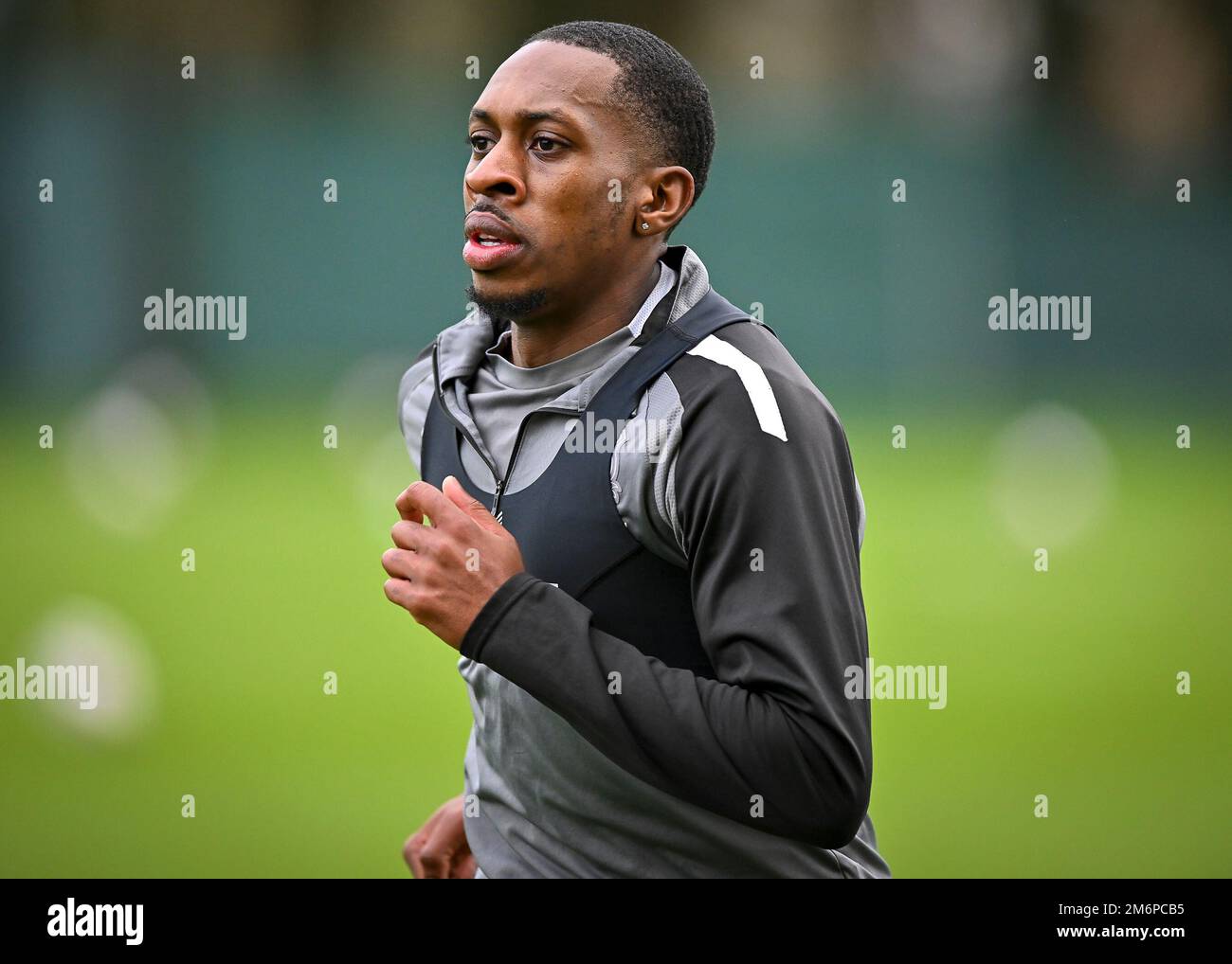Plymouth Argyle wing back Mickel Miller (14)  warming up during the Plymouth Argyle Training Session at Plymouth Argyle Training Ground, Plymouth, United Kingdom, 5th January 2023  (Photo by Stanley Kasala/News Images) in Plymouth, United Kingdom on 1/5/2023. (Photo by Stanley Kasala/News Images/Sipa USA) Stock Photo