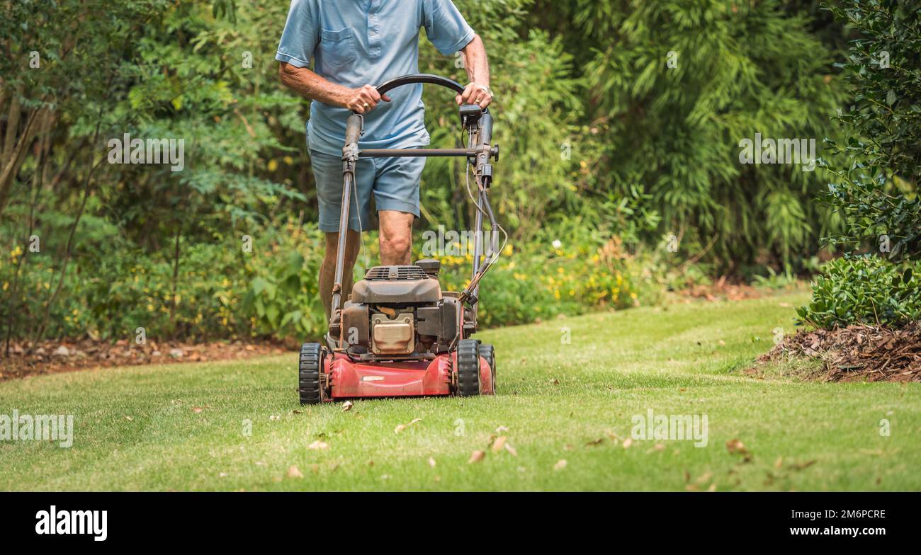 Lawn mowing landscaper gardener hi-res stock photography and