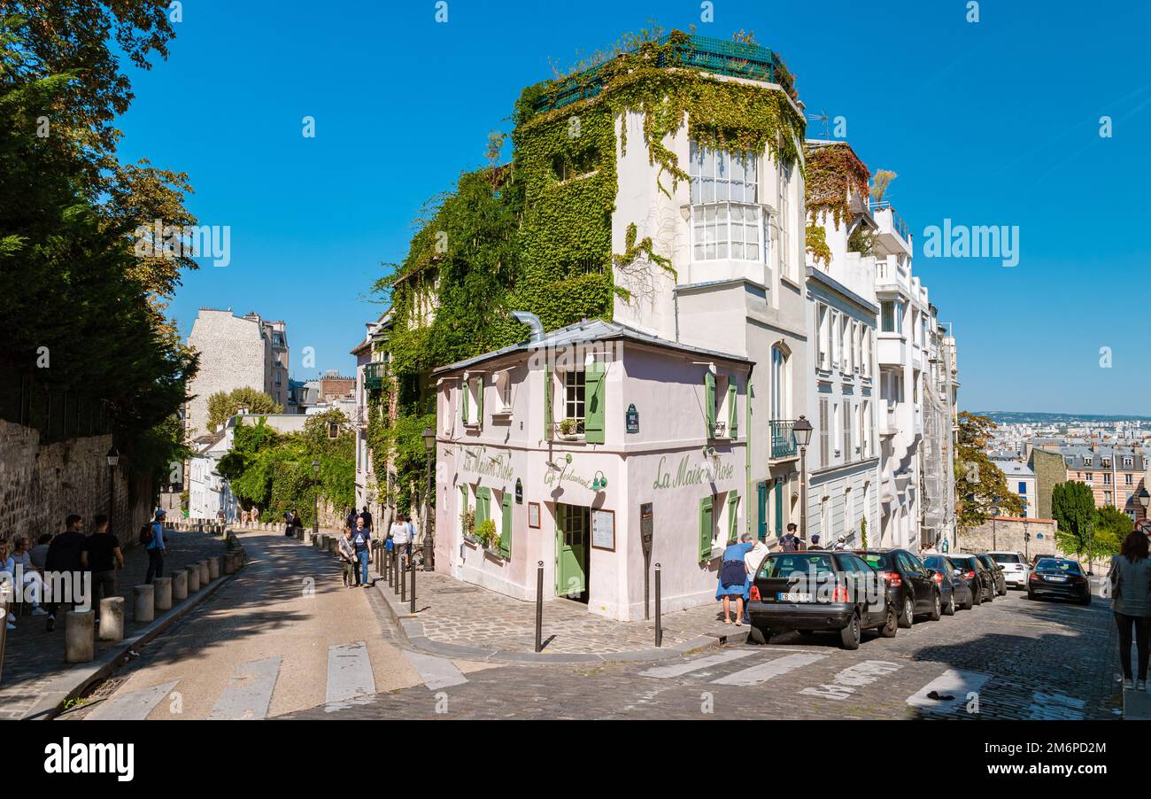 Streets of Montmartre Paris France in the early morning with cafes and restaurants, La Maison Rose Stock Photo