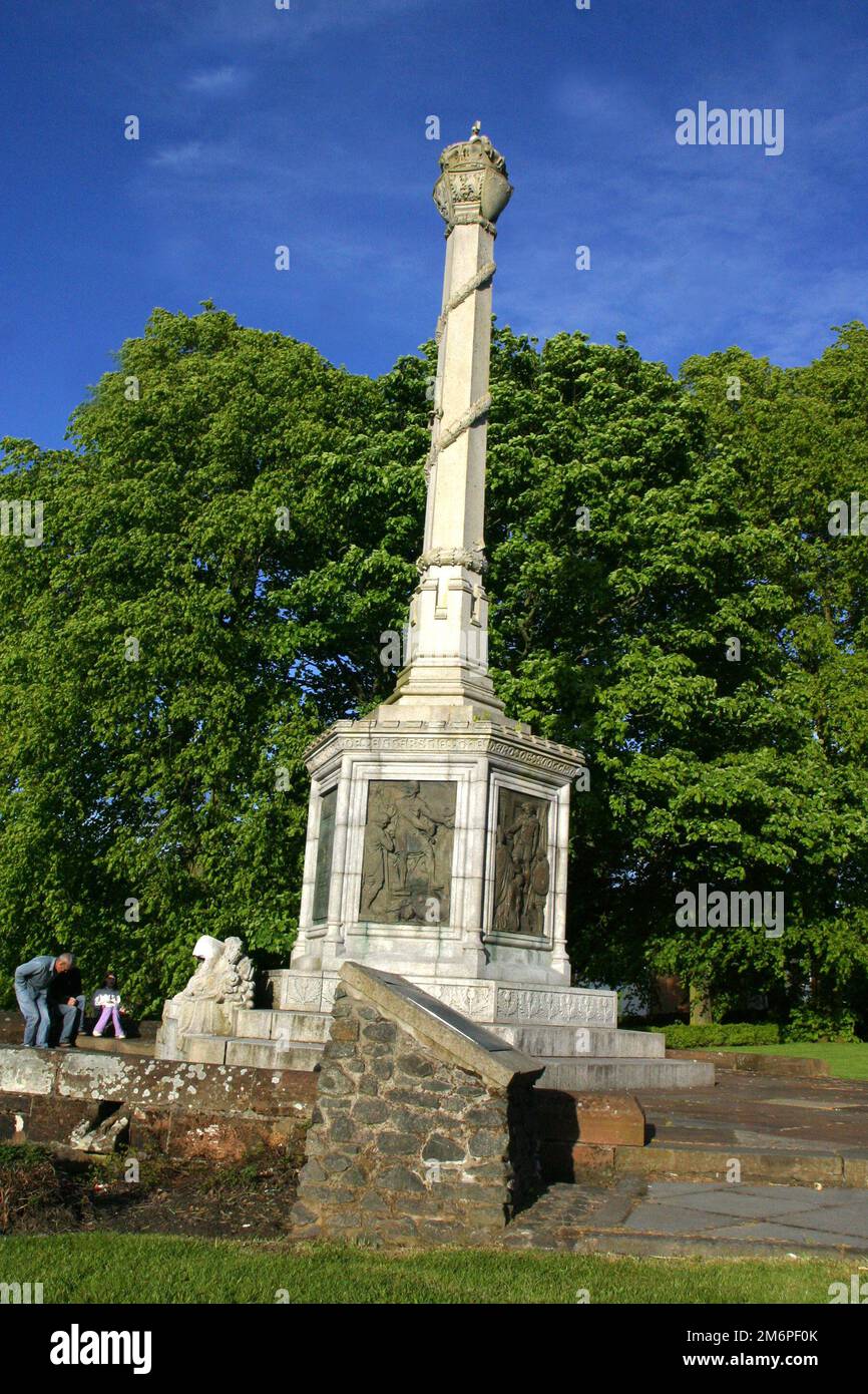 Renfrewshire Wallace Monument Elderslie, Johnstome, Scotland, UK. This memorial stands near a site which, according to long-standing tradition, is said to be the birthplace of Sir William Wallace, Guardian of Scotland. This monument to our National Hero was erected in Elderslie as a victorian tourist attraction.Its located at assumed birthplace of Wallace. The overall shape of the memorial is like that of a mercat cross; it was designed by John C.T. Murray and J. Andrew Minty, and was erected in 1912. Stock Photo