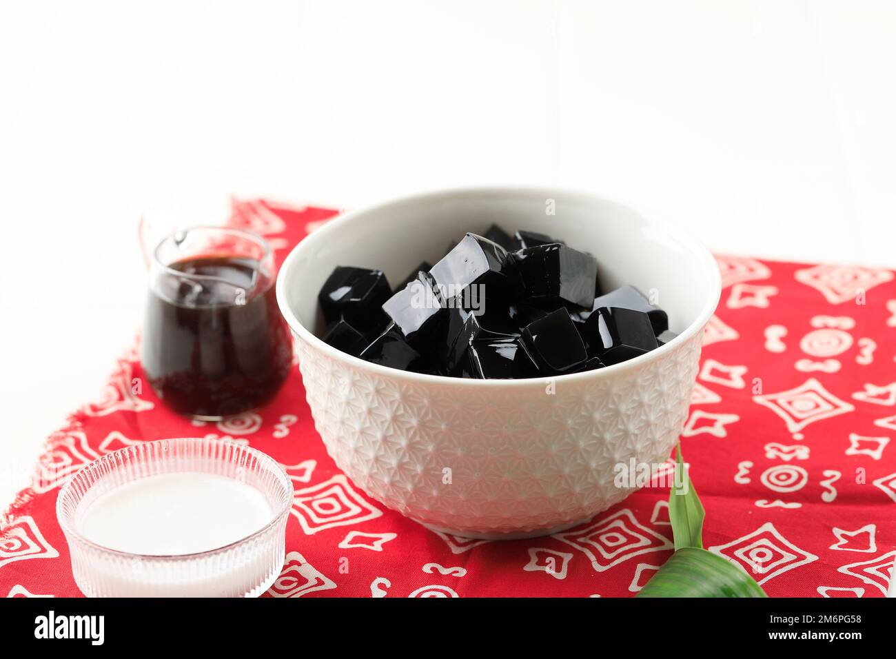 Black Grass Jelly or Leaf Herb Jelly Janggelan. Dessert Eaten in South East Asia. Made from Platostoma palustre. Stock Photo