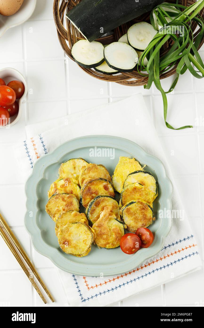 Top View Hobak Jeon, Korean Green Zucchini Pancake. Pan Fried Sliced