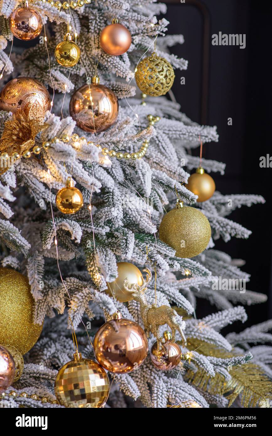 Beautiful Christmas tree with garlands, balls and toys. Preparing your ...