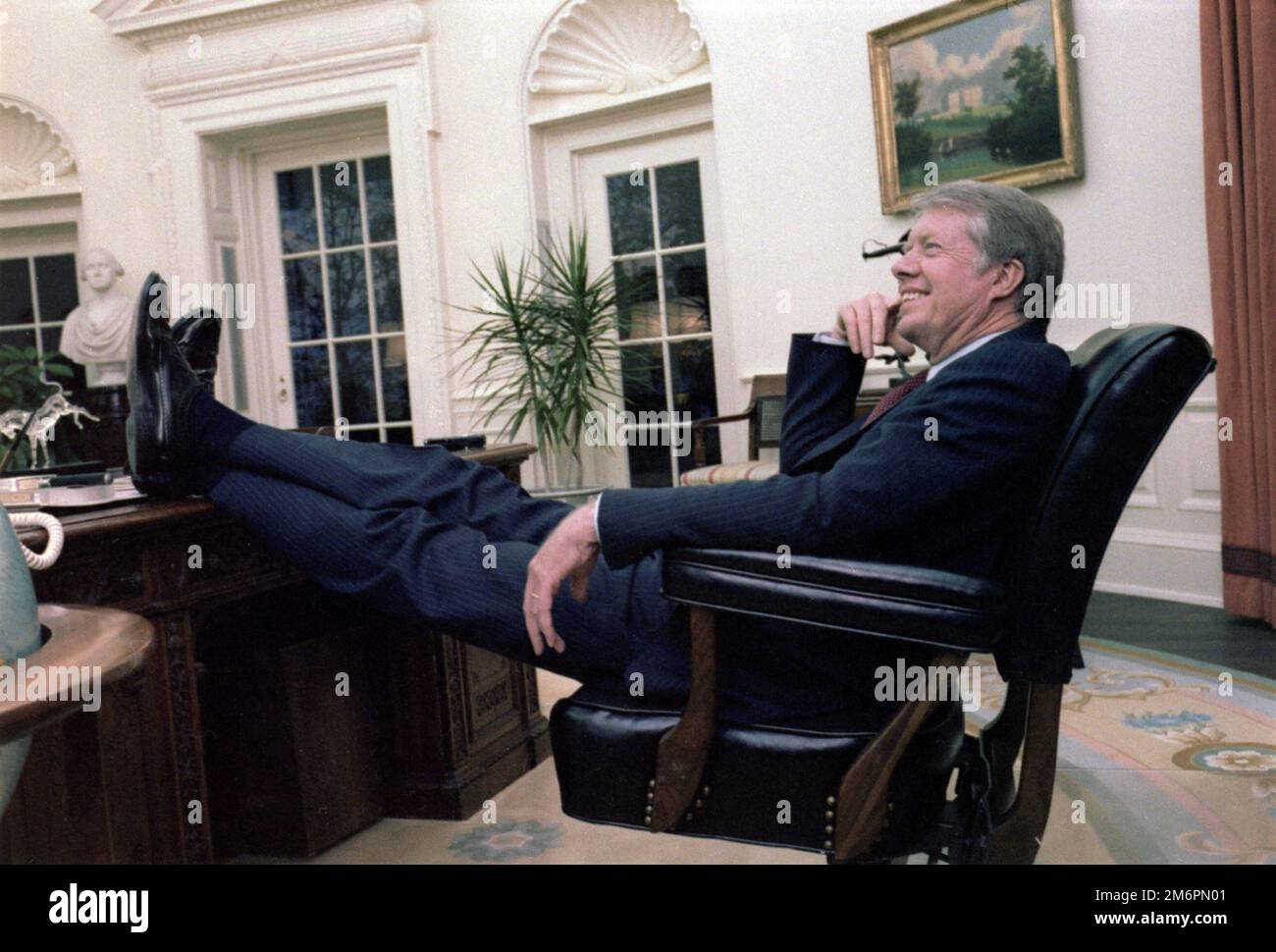 President of The United States, Jimmy Carter, sitting in the Oval office, April 18, 1978, White House photo. Stock Photo