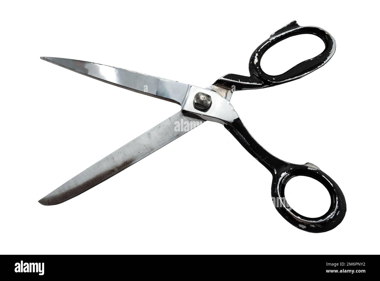 Old retro tailor's scissors on a white background. Scissors for the