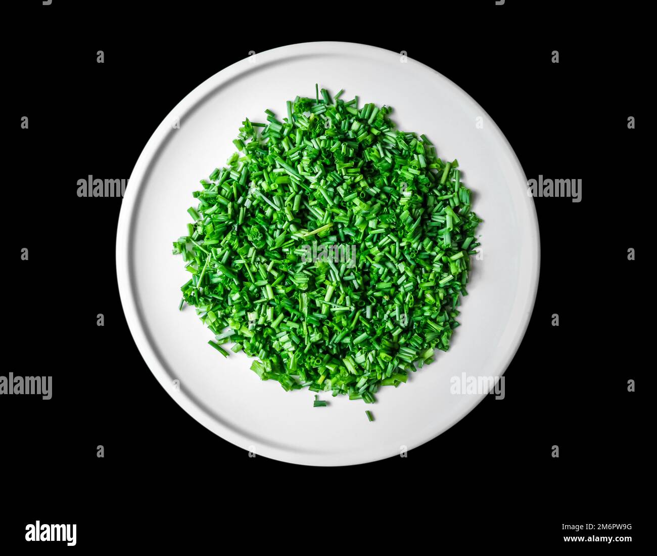 Fresh cut chives on a plate Stock Photo