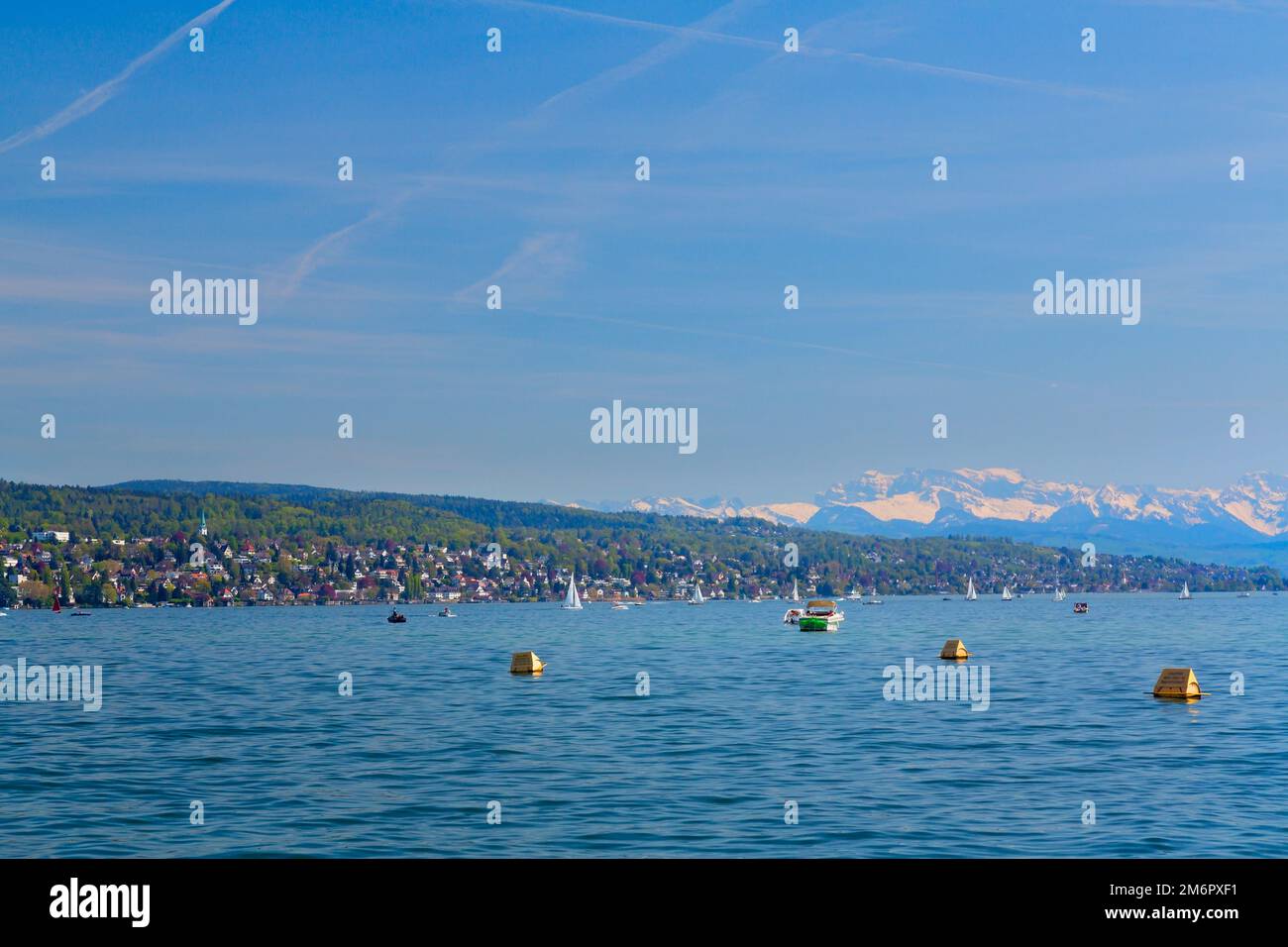 Panoramic view of Zurich on a sunny day, Lake Zurich and swiss Alps ...