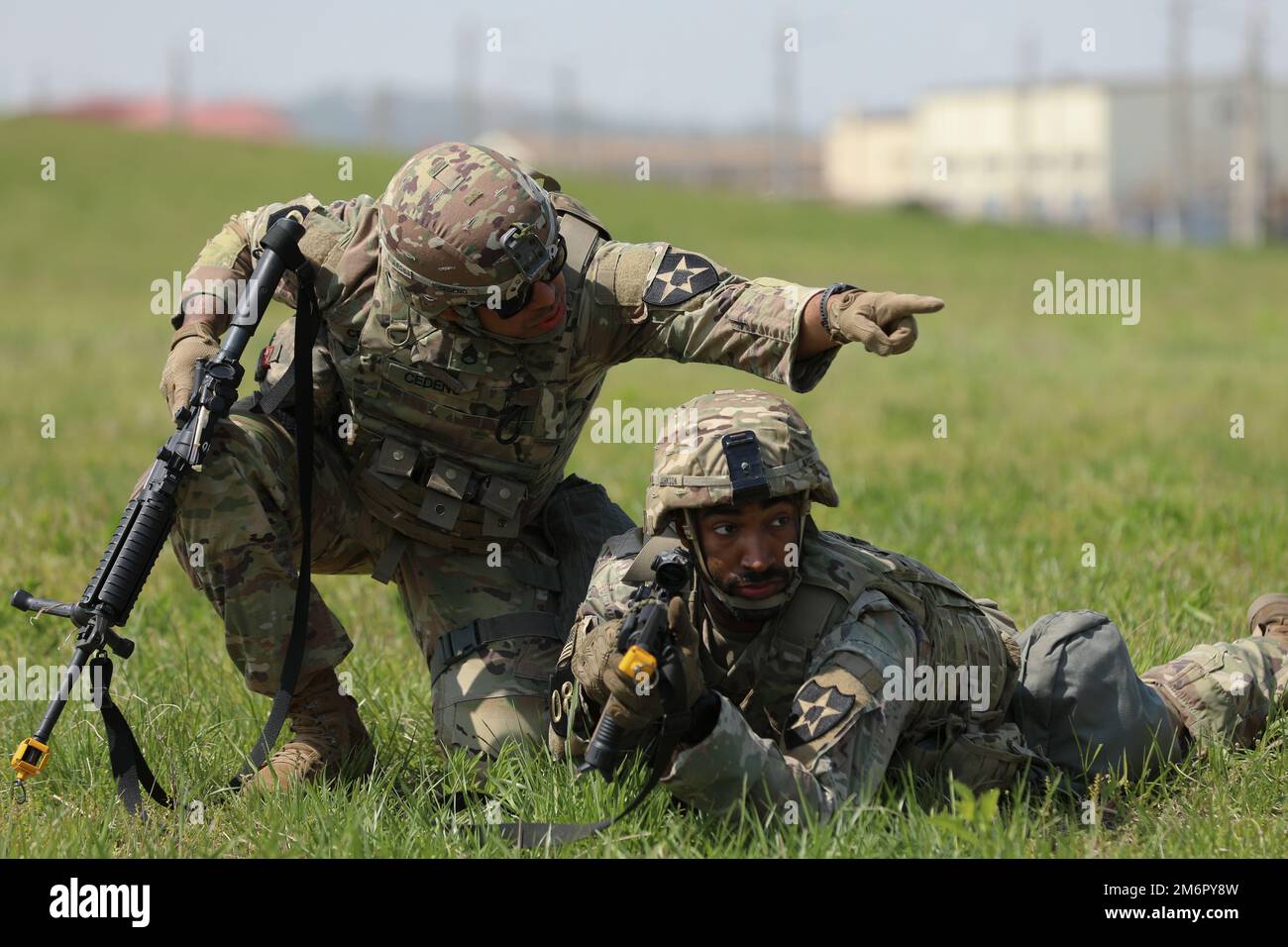 Soldiers from 2nd Infantry Division/ROK-U.S. Combined Division arrive to Camp Humphreys for the final assessment of the competition, Camp Humphreys, Republic of Korea, May 4, 2022. Soldiers participated in the competition using basic soldiering skills in land navigation, marksmanship, weapons and tactical operations throughout the course. Stock Photo