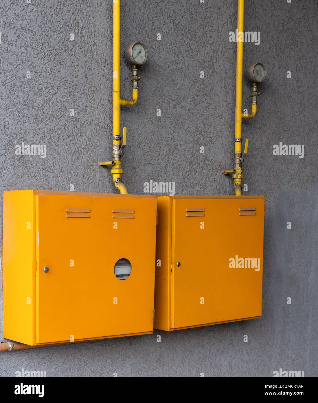 Gas communication and gas meter on wall of apartment house Stock Photo