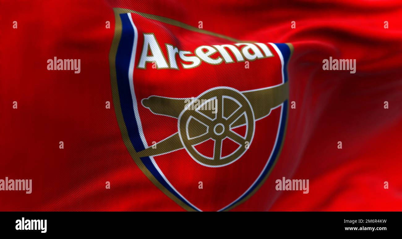 London, UK, DEC 2022: flag of Arsenal Football Club waving. Arsenal is a London-based Premier League team. Rippled Fabric. Textured background. Stock Photo