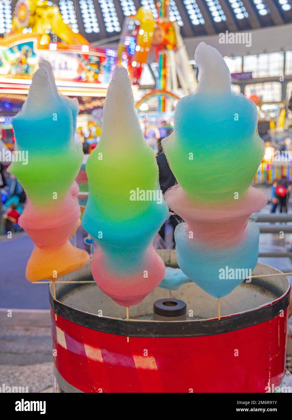 Rainbow Cotton Candy Floss Machine at Carnival Fun Fair Stock Photo