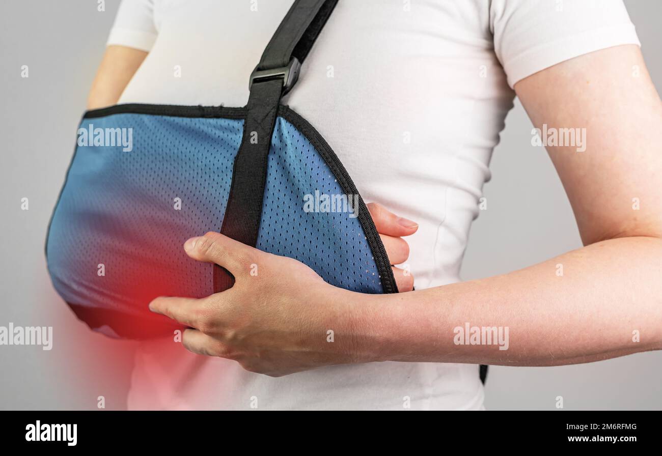 Hand in arm sling, arm ache, trauma, injury treatment. High quality