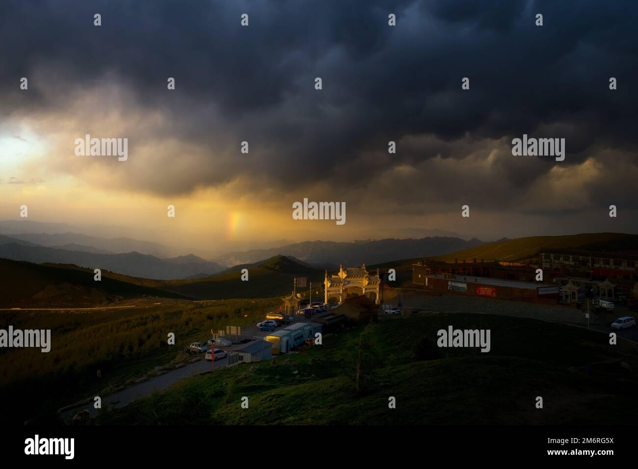 A beautiful stormy sky with a rainbow over Mount Wutai in China Stock Photo