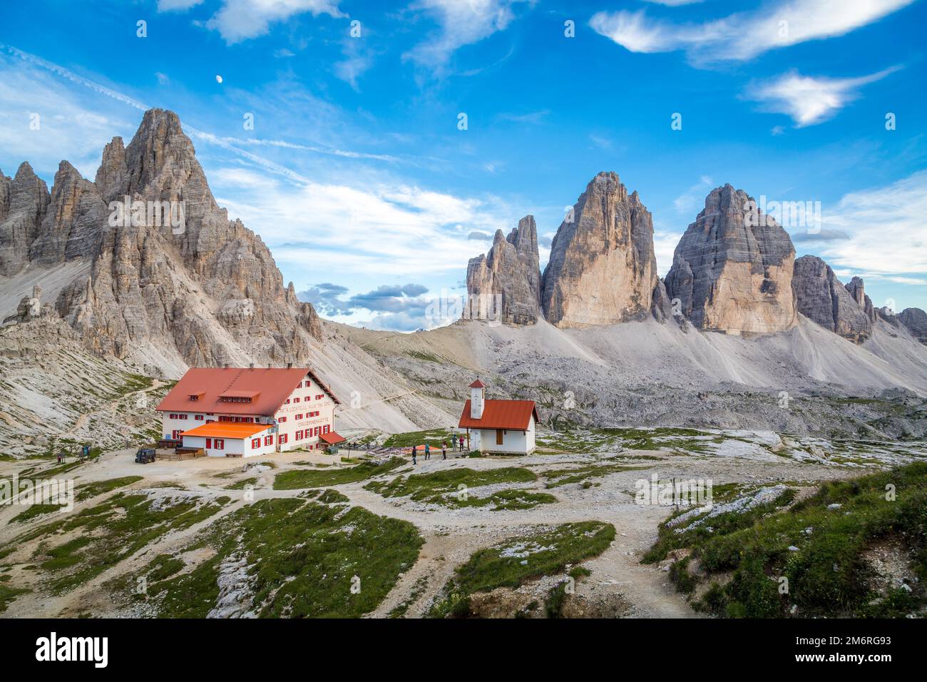 View of mountain hut Dreizinnenhuette and chapel with rock massif ...