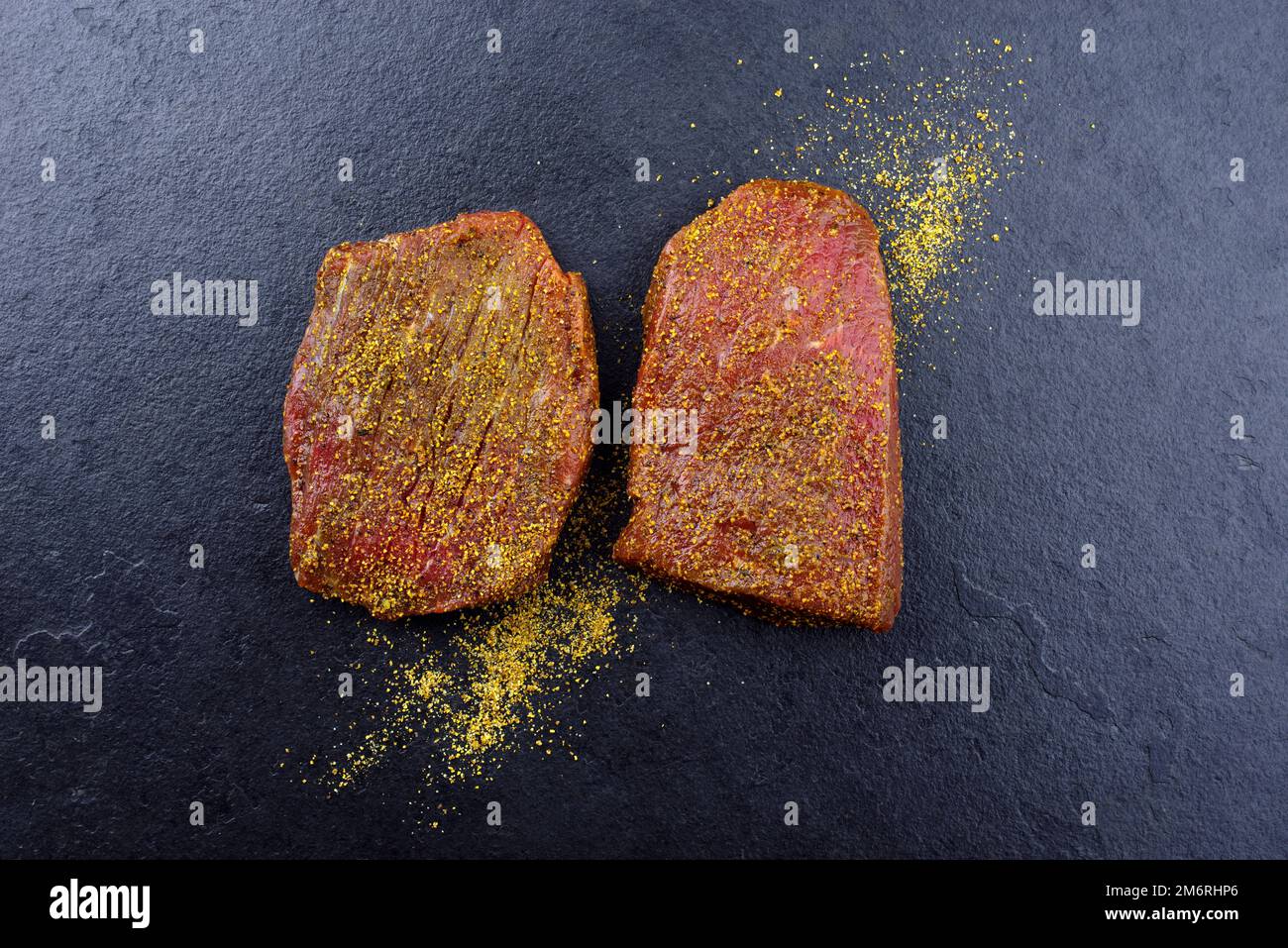 Peppered Rump Raw marinated pepper rump steak of beef prepared for a summer barbecue ...