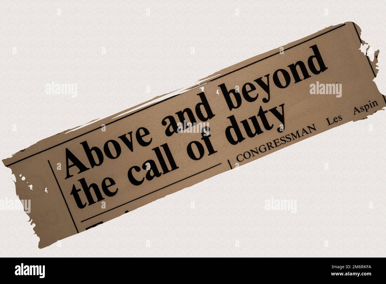 Above and beyond the call of duty - news story from 1975 newspaper headline article title - overlay sepia Stock Photo