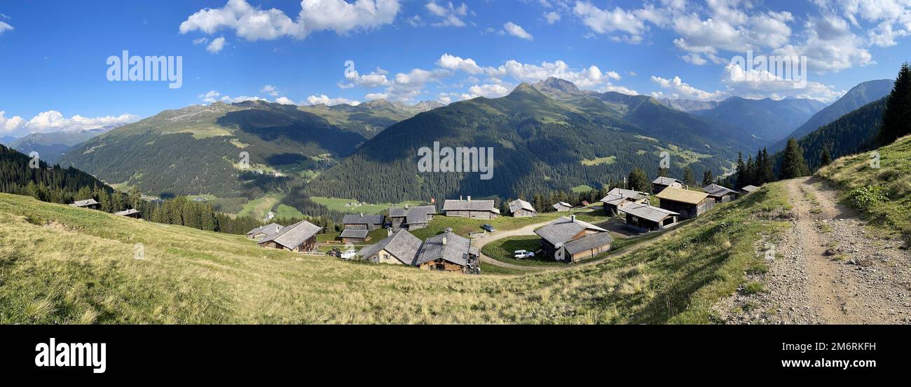 Panorama over alpine huts of Stafelalp to Rinerhorn, Davos, Grisons, Switzerland Stock Photo