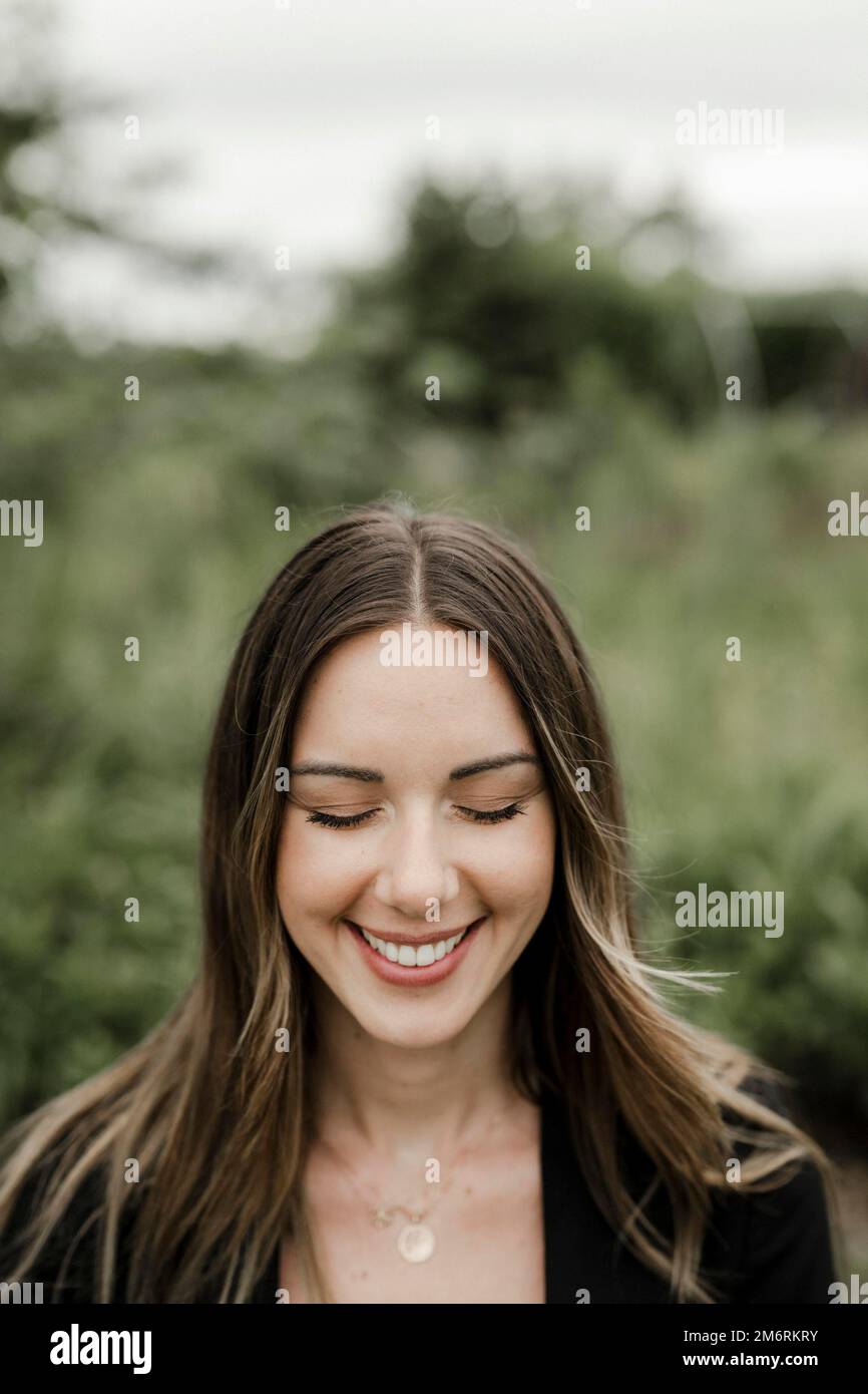 Young woman with closed eyes in portrait, 25 Stock Photo