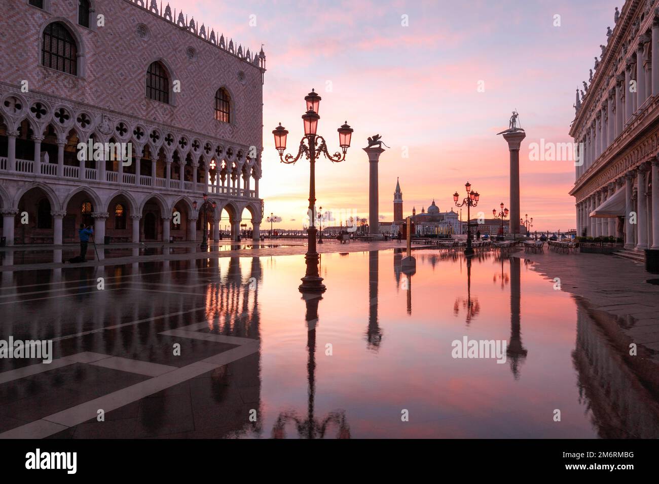The Piazzetta in the rising sun, during the Acqua alta flood, Venice, Italy Stock Photo