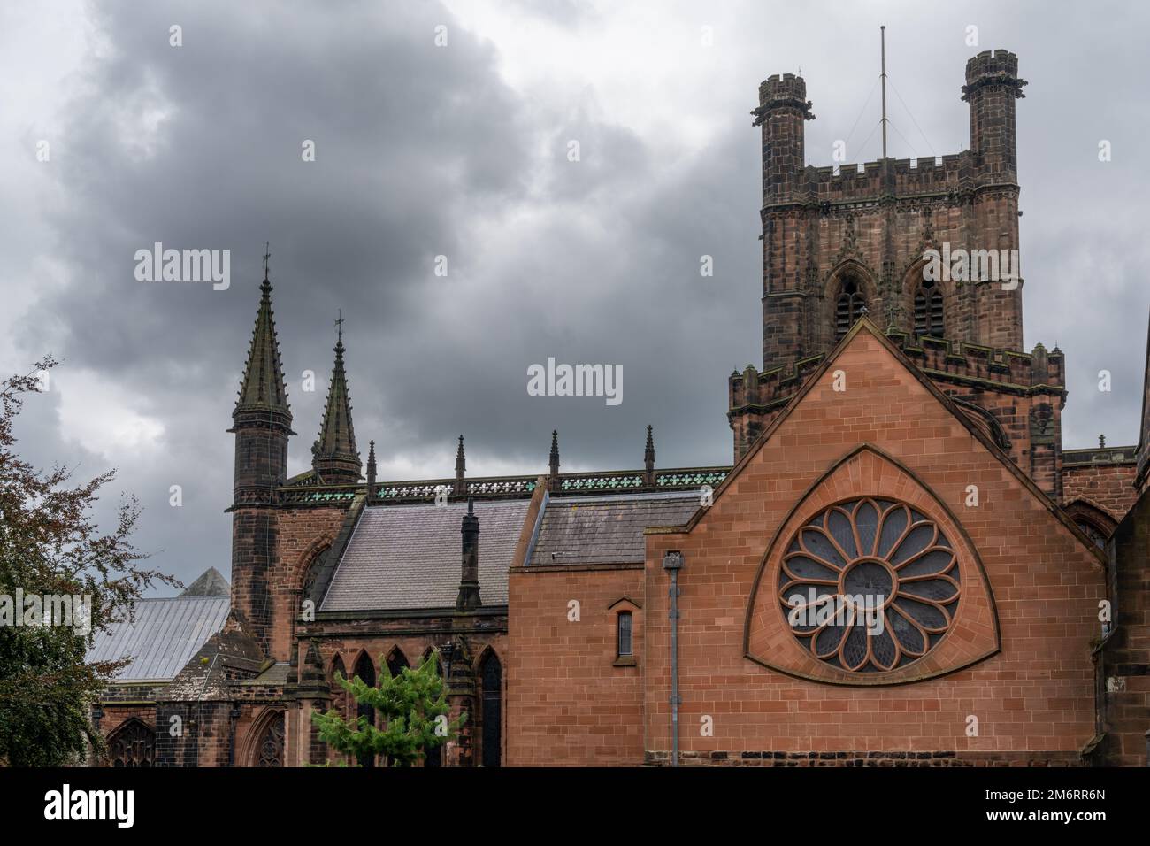 Architectural detail of the historic Chester Cathedral in Cheshire under an overcast sky Stock Photo