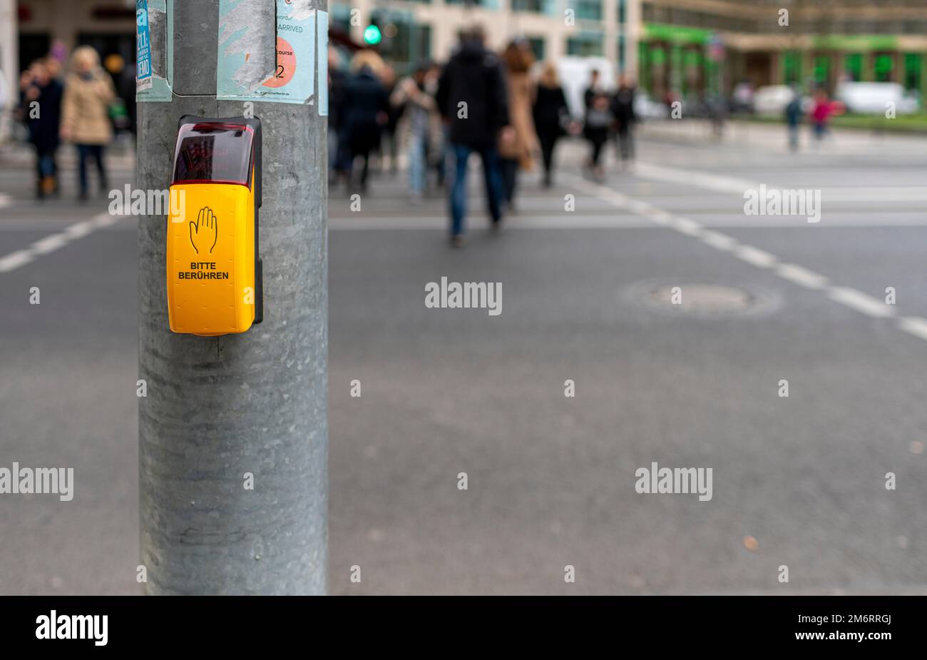 Touch sensor for pedestrians on a traffic light pole, Berlin, Germany