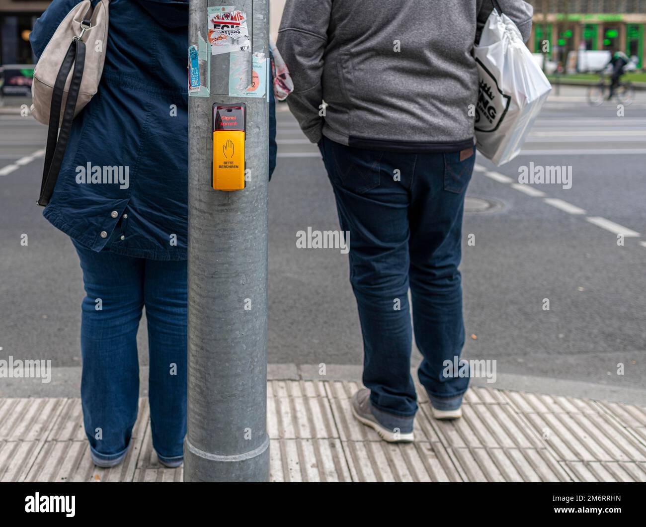 Touch sensor for pedestrians on a traffic light pole, Berlin, Germany