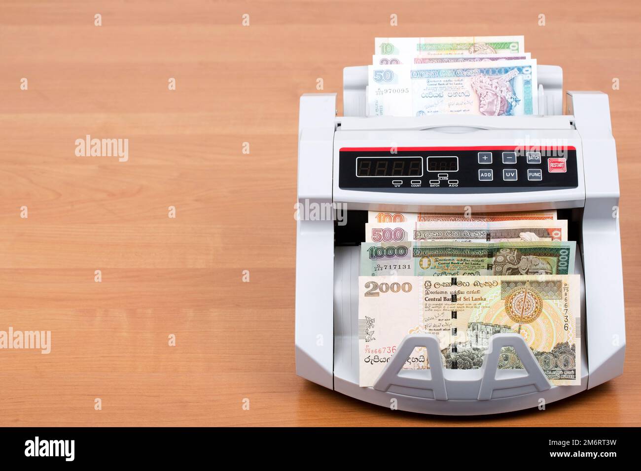 Old Sri Lankan money in the counting machine Stock Photo Alamy