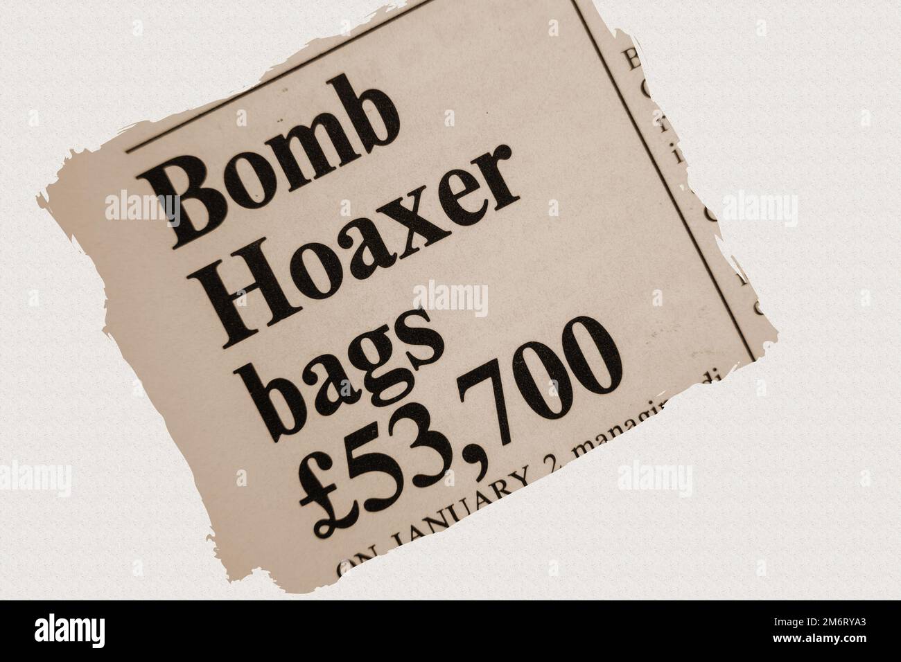news story from 1975 newspaper headline article title - Bomb Hoaxer bags £53,700 in sepia Stock Photo