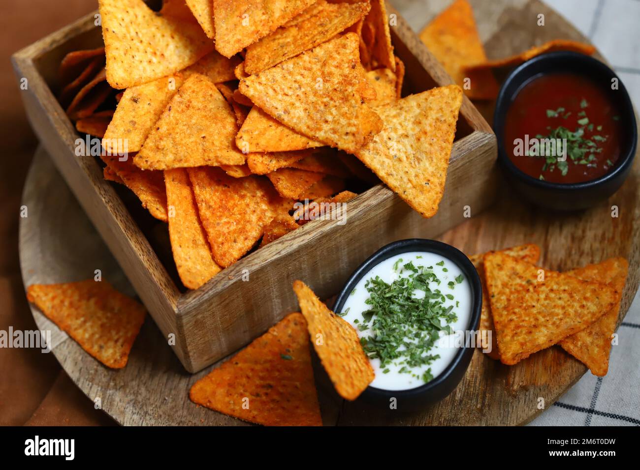 Chips nachos with sauces. Mexican snacks. Stock Photo