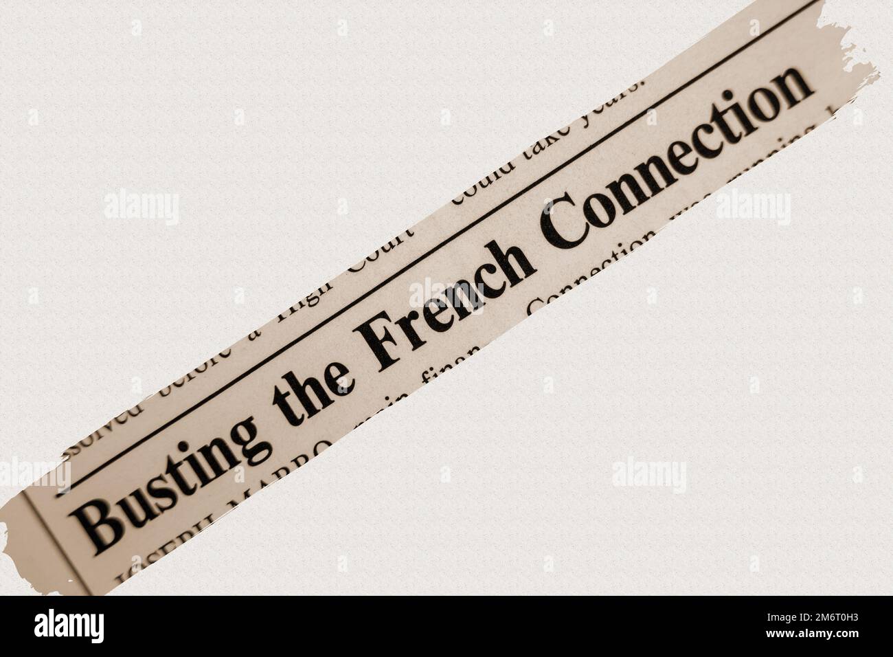 news story from 1975 newspaper headline article title - Busting the French Connection in sepia Stock Photo