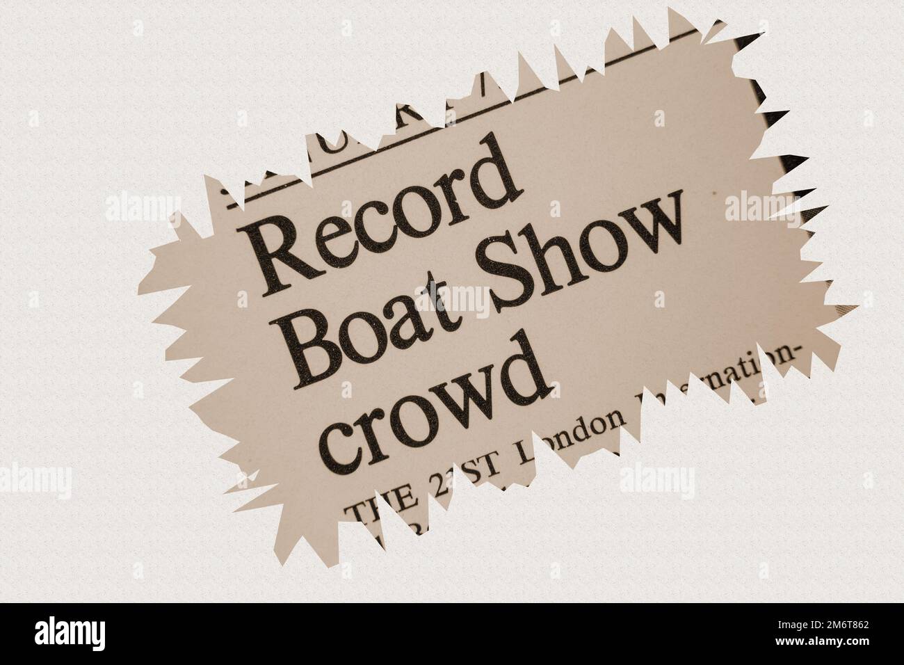 news story from 1975 newspaper headline article title - Record Boat Show crowd in sepia Stock Photo