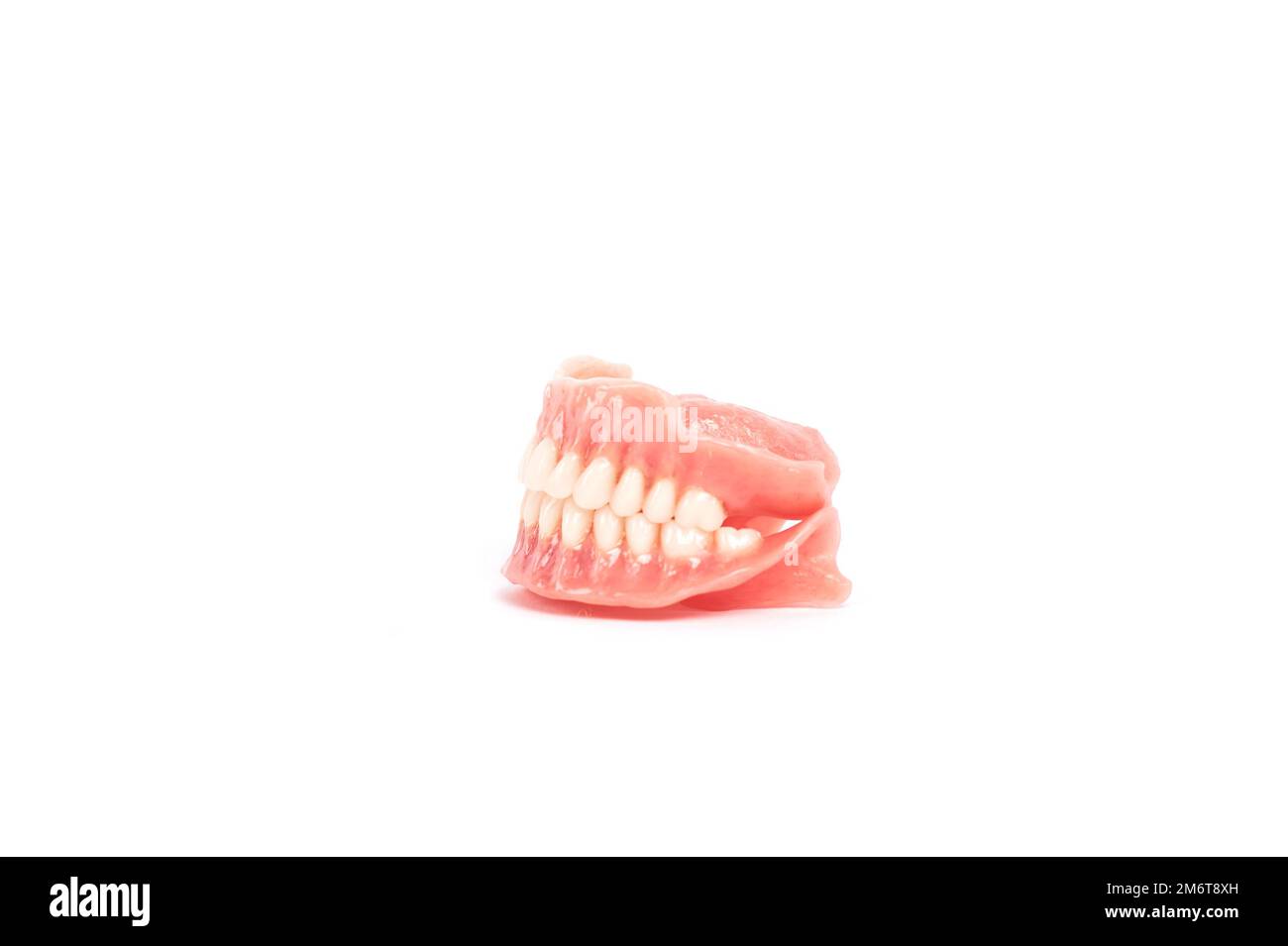 Dental prostheses on a white background. Beautiful teeth ceramic press