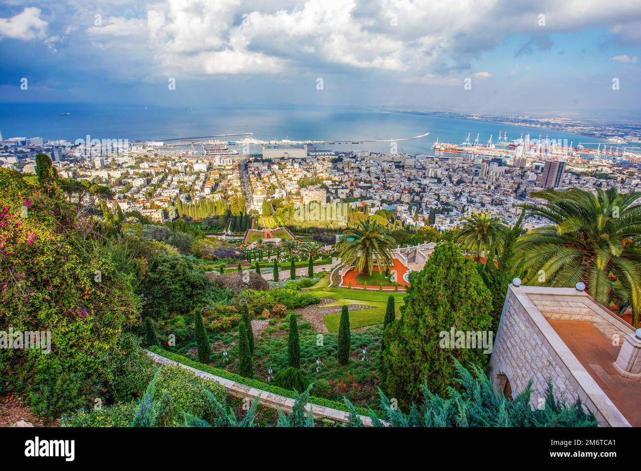 Idyllic view on Bahai Gardens and town  Haifa and port. Tropical Israel clymate: flowering in winter ! Stock Photo