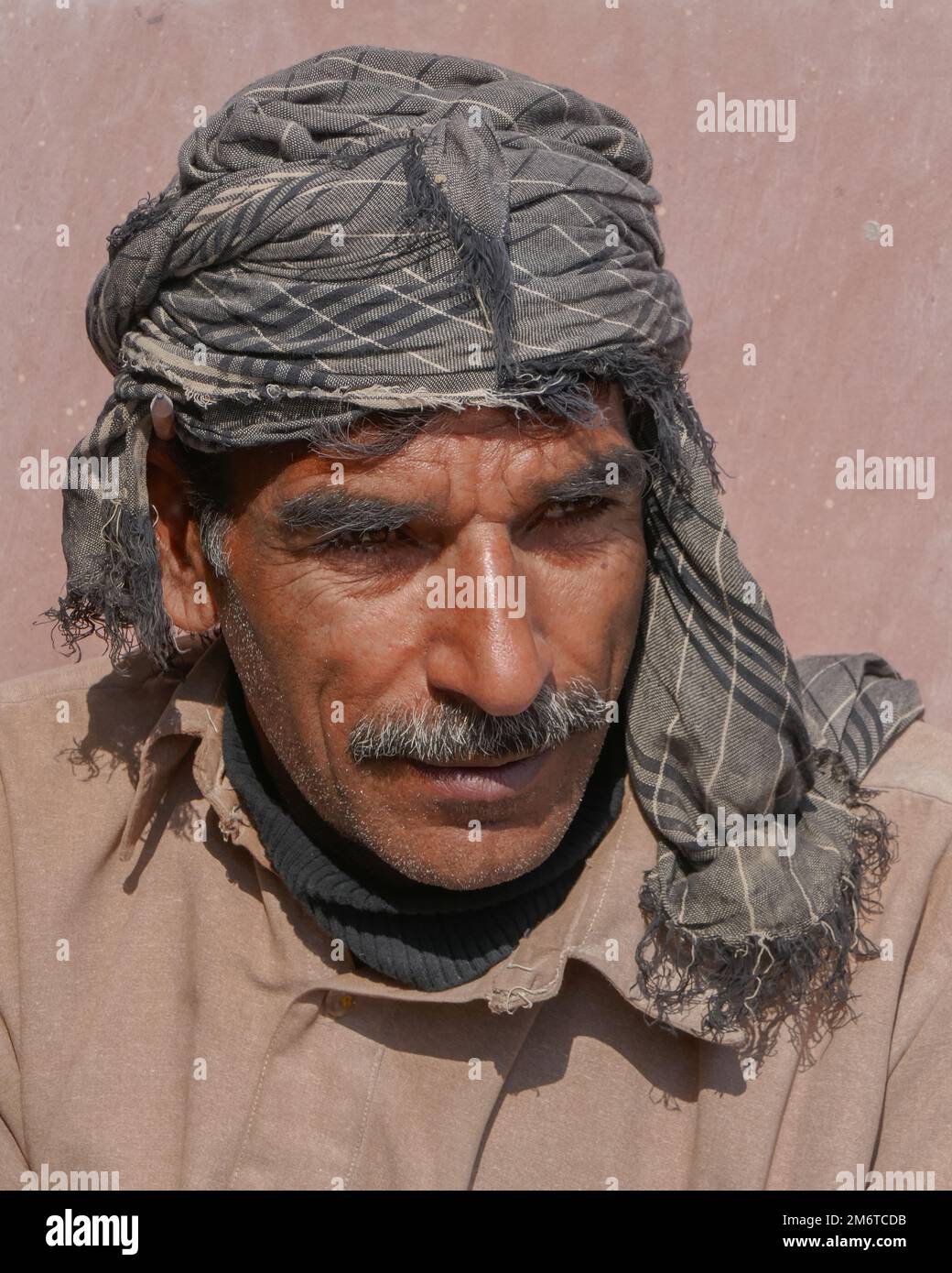 Grey head scarf hi-res stock photography and images - Alamy