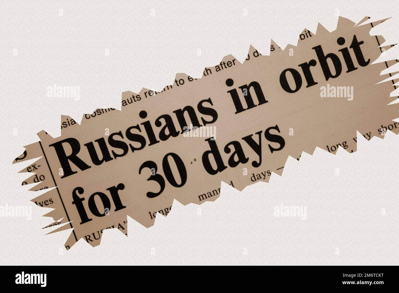 Russians in orbit for 30 days - news story from 1975 newspaper headline article title with overlay in sepia Stock Photo