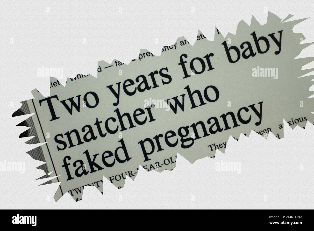 Two years for baby snatcher who faked pregnancy - news story from 1975 newspaper headline article title with overlay Stock Photo