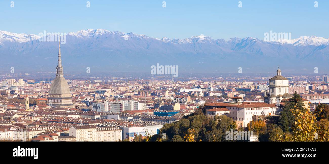 Turin panorama with Alps and Mole Antonelliana, Italy. Skyline of the symbol of Piedmont Region with Monte dei Cappuccini - Capp Stock Photo