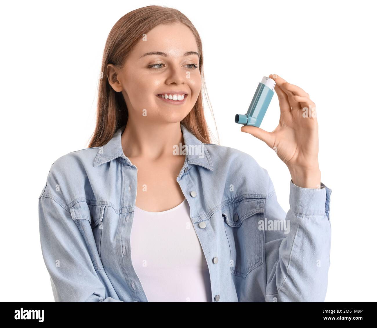Young woman with inhaler on white background Stock Photo - Alamy
