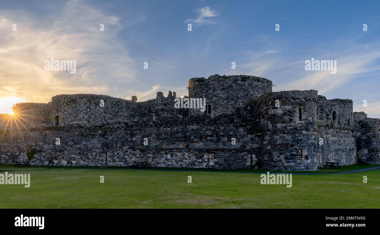View of the historic Beaumaris Castle in Anglesey at sunset Stock Photo ...