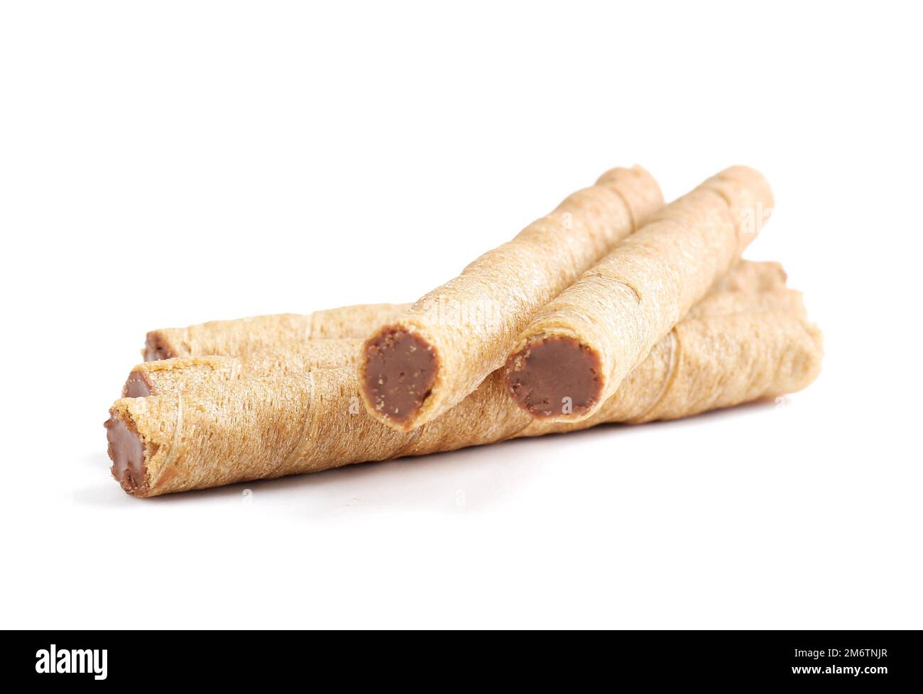 Tasty wafer rolls with boiled condensed milk isolated on white background Stock Photo