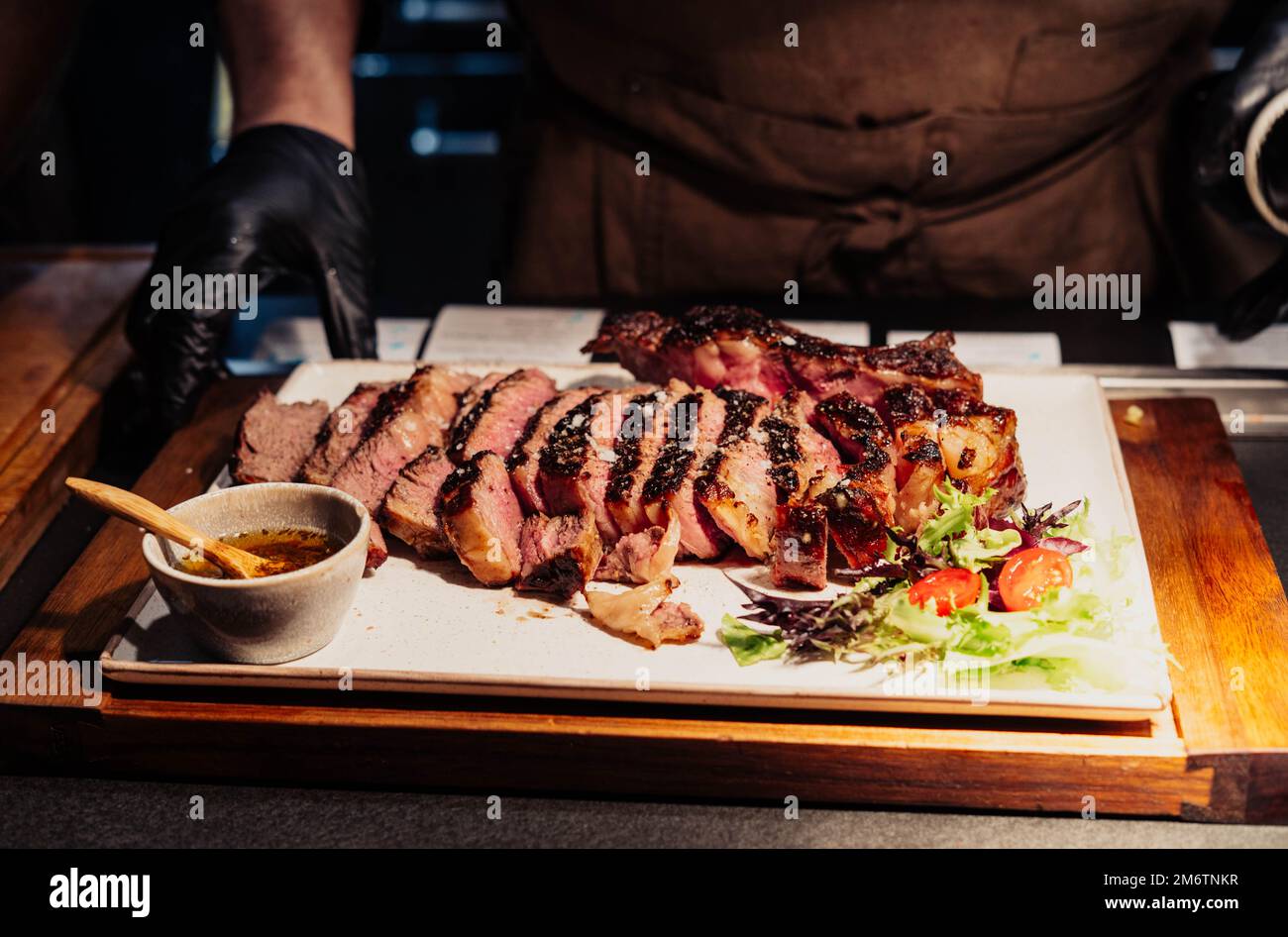 Excellent cuts of Argentine meat on a white plate Stock Photo - Alamy