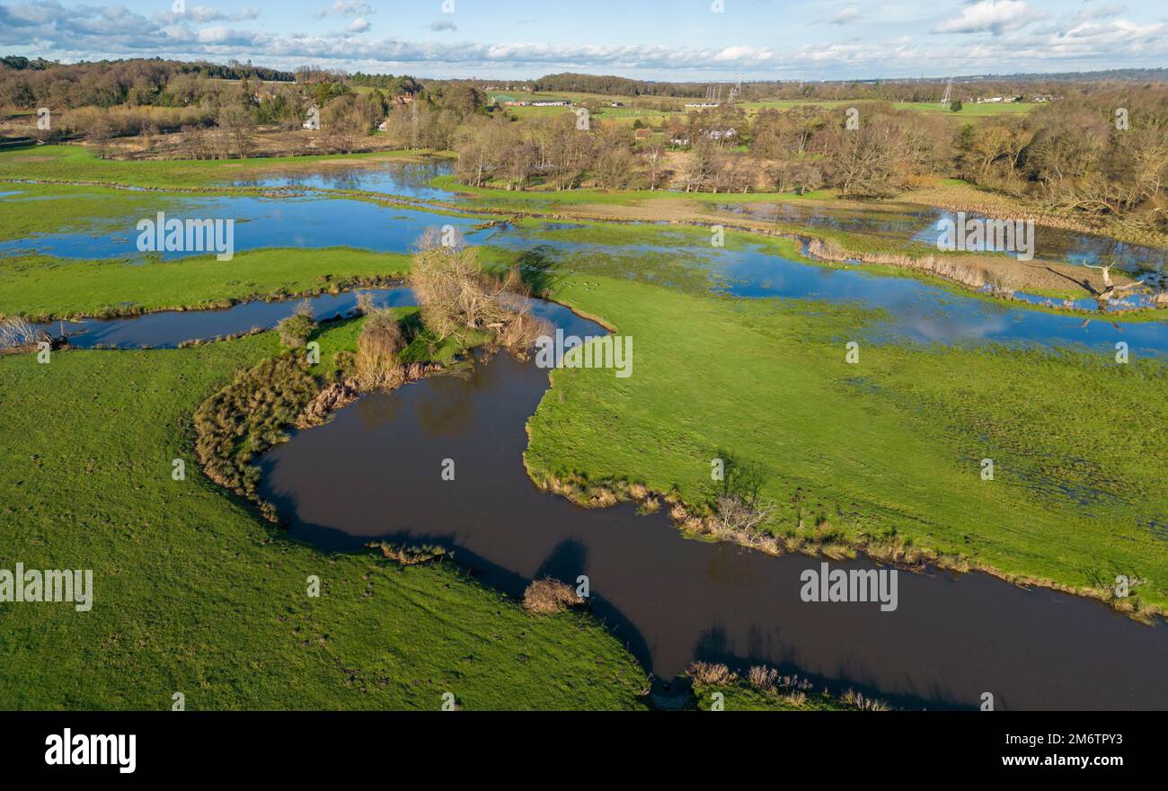 Aerial view of flooded fields close to Newark Priory on the River Wye, Pyrford, Surrey, UK Stock