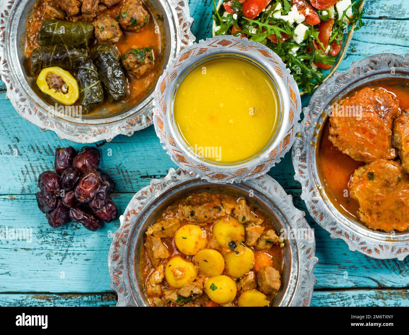 Eid Mubarak Traditional Ramadan Iftar dinner. Assorted tasty food in ...