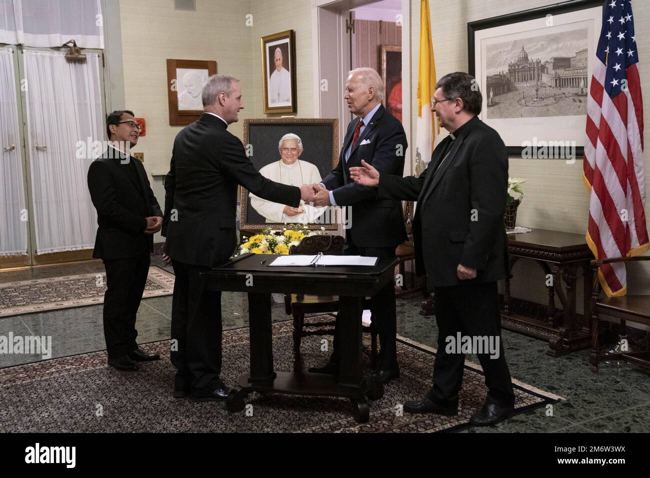 Washington, United States. 05th Jan, 2023. President Joe Biden speaks with Msgr. John Paul Pedrera, Msgr. Seamus Horgan, and Archbishop Christophe Pierre after signing the condolence book for Pope Emeritus Benedict XVI at the Apostolic Nunciature of the Holy See in Washington, DC, on Thursday, January 5, 2023. Photo by Sarah Silbiger/UPI Credit: UPI/Alamy Live News Stock Photo